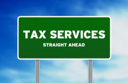 High resolution graphic of a tax services highway sign on Cloud Background.