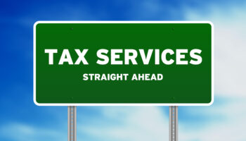 High resolution graphic of a tax services highway sign on Cloud Background.